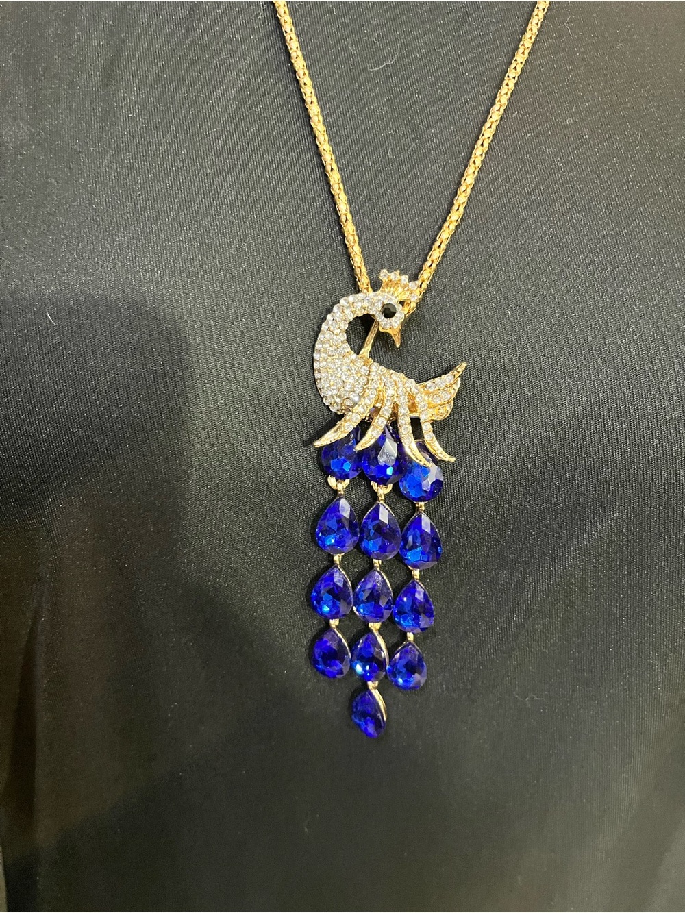 Gold Peacock Pendant Necklace with Royal Blue Crystal Drops